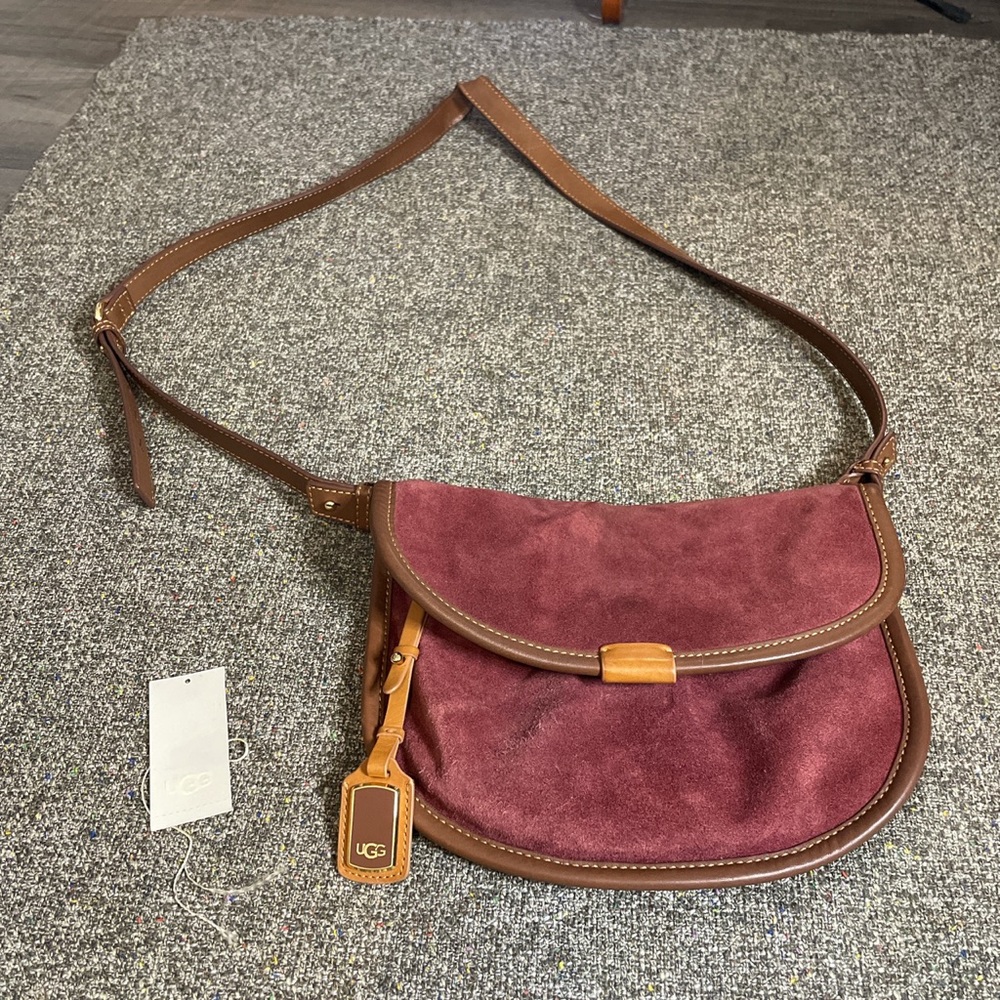 Ugg suede bag burgundy. Jeans mark on the back of the bag. With tag